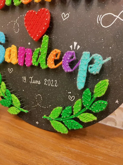 Nameplate Featuring a Leafy Embrace: Two Names with String Art