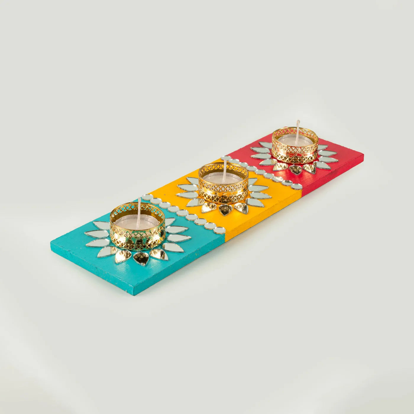Mirror-operated multicoloured tealight holder